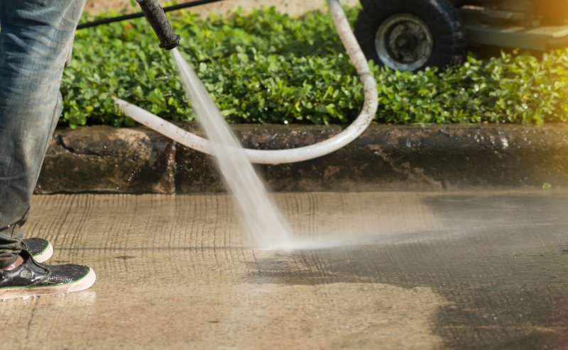 power washing concrete with rust stains